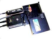 PORTA-LIBS-2000 system- The entire platform, including the laser, sample compartment, and trigger module measures 5 cm x 21 cm x 10 cm. Not shown is the battery pack or the laptop computer.